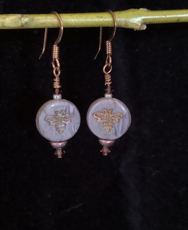 Earrings: Austrian crystal and Czech glass with bee imprint in shades of grey, clear and purple, copper finish ear wires