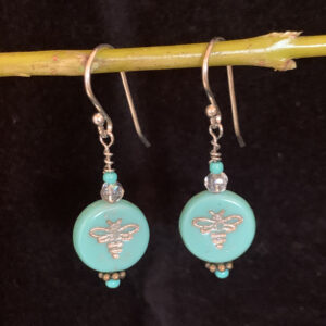 Earrings: Austrian crystal and Czech glass with bee imprint in shades of turquoise and clear, silver finish ear wires