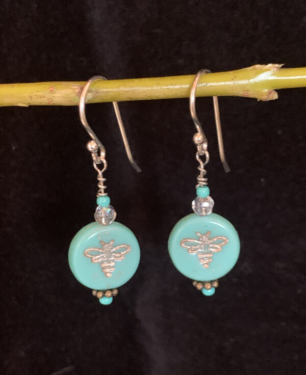 Earrings: Austrian crystal and Czech glass with bee imprint in shades of turquoise and clear, silver finish ear wires