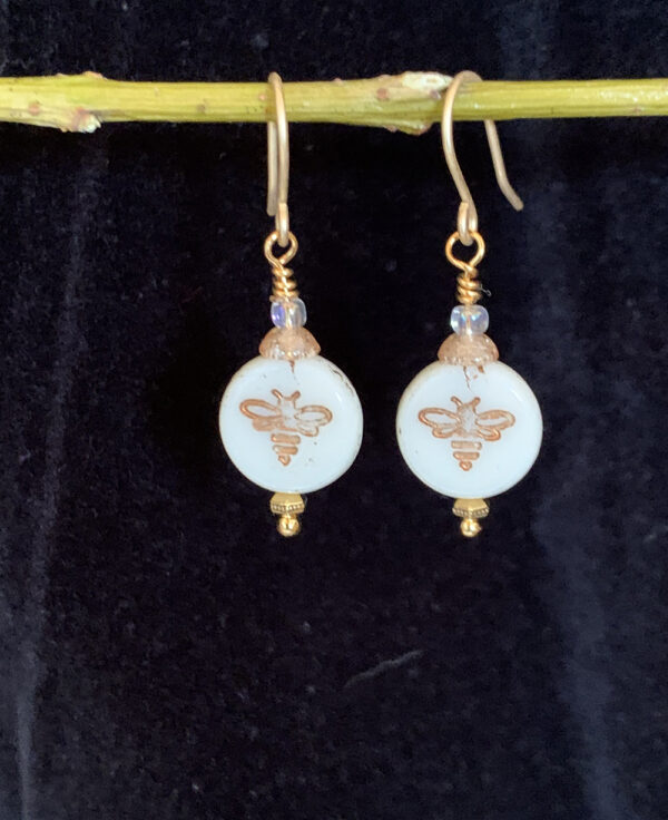 Earrings: Austrian crystal and Czech glass with bee imprint. Shades of cream, gold, iridescent clear, gold finish ear wires